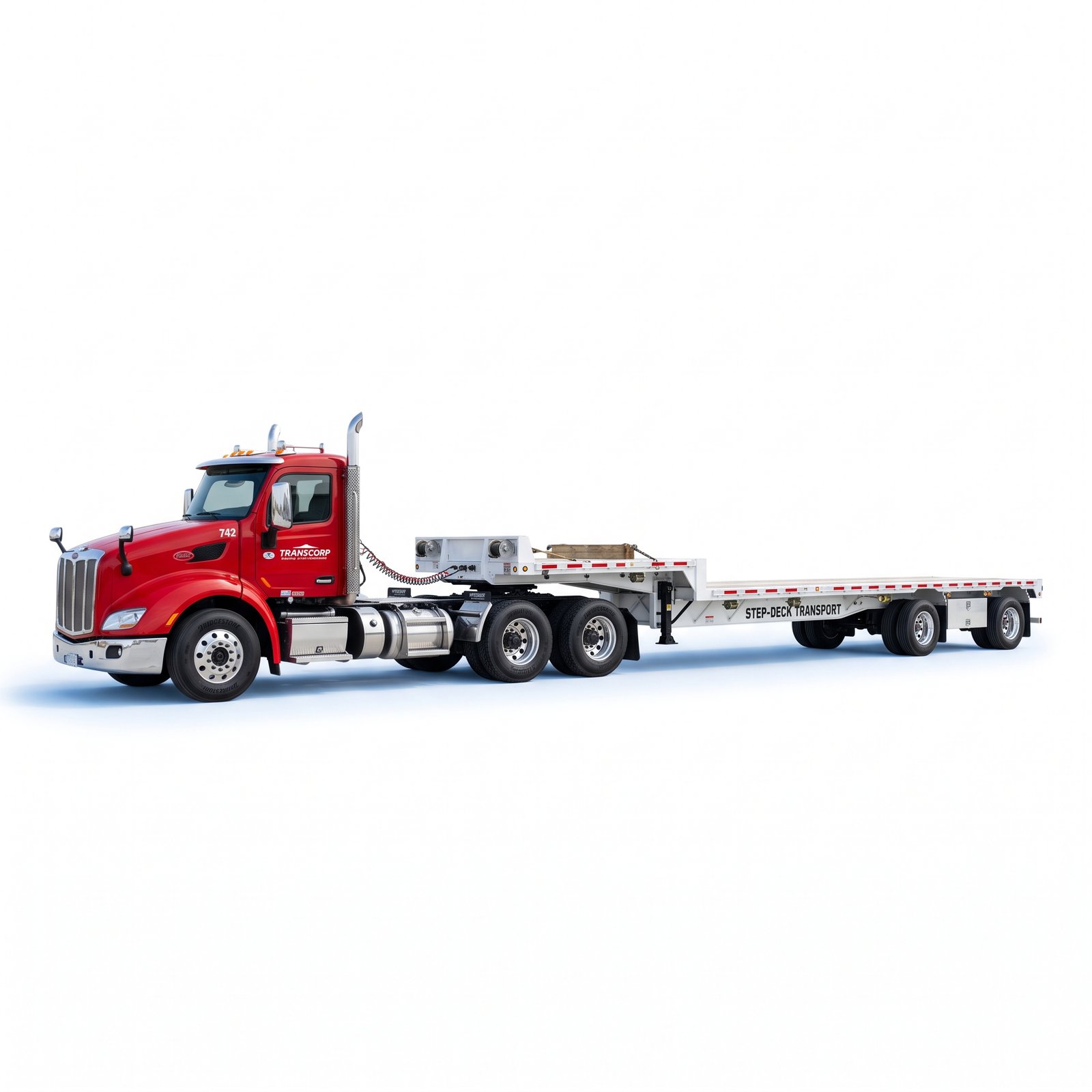 Step deck trailer carrying equipment